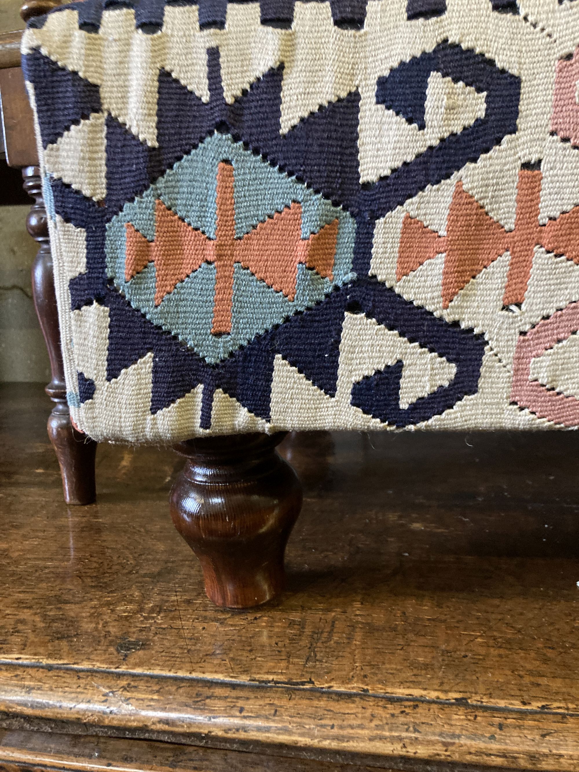 A Victorian style rectangular Kilim upholstered footstool, length 110cm, width 65cm, height 37cm